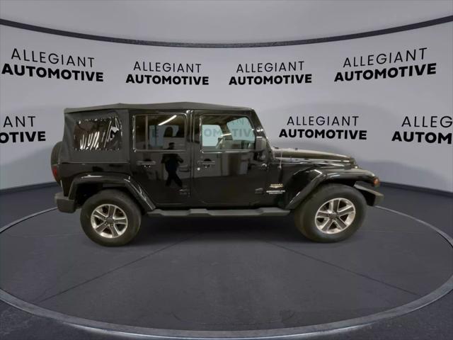 used 2014 Jeep Wrangler Unlimited car, priced at $19,117