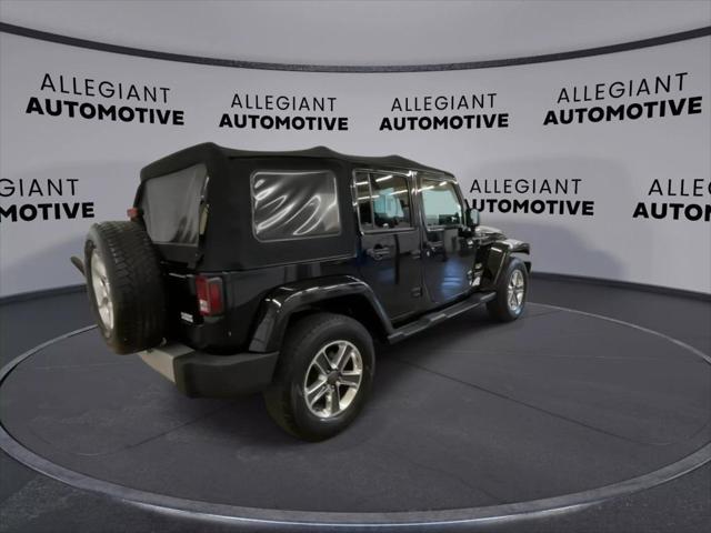 used 2014 Jeep Wrangler Unlimited car, priced at $19,938