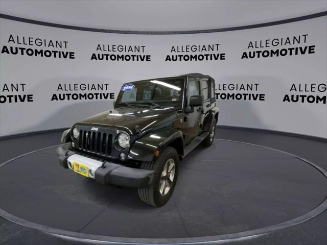 used 2014 Jeep Wrangler Unlimited car, priced at $19,117