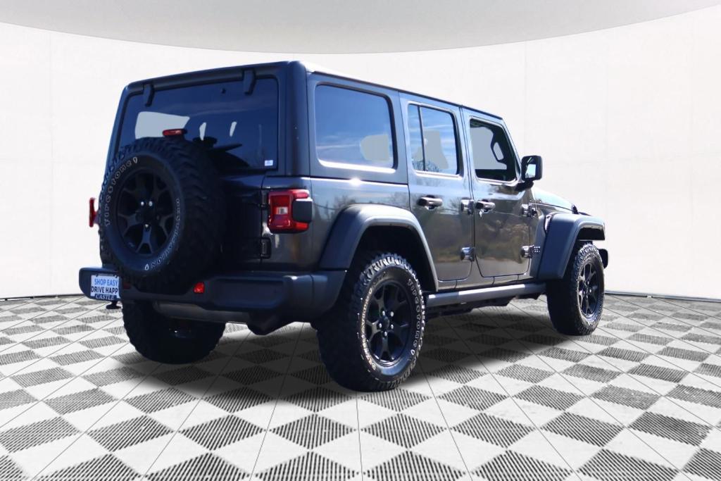 used 2021 Jeep Wrangler Unlimited car, priced at $29,977