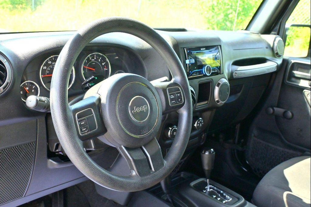 used 2017 Jeep Wrangler Unlimited car, priced at $17,597