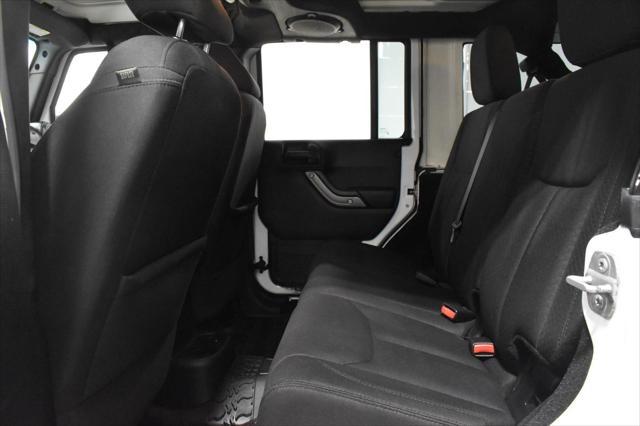 used 2014 Jeep Wrangler Unlimited car, priced at $14,502