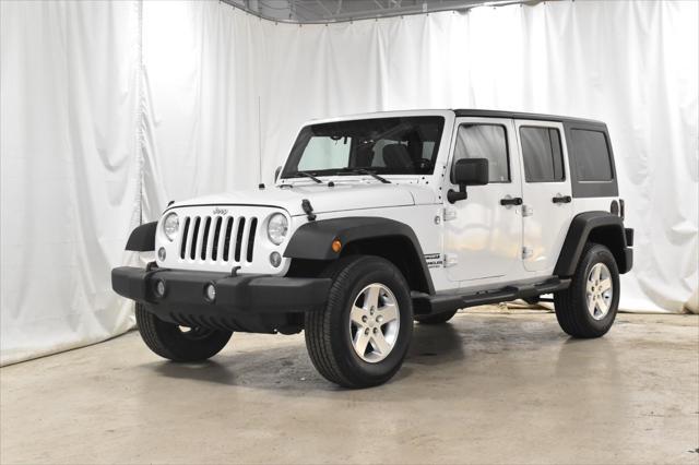 used 2014 Jeep Wrangler Unlimited car, priced at $14,502