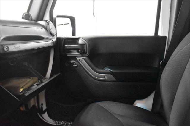 used 2014 Jeep Wrangler Unlimited car, priced at $14,502