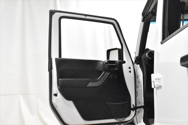 used 2014 Jeep Wrangler Unlimited car, priced at $14,502
