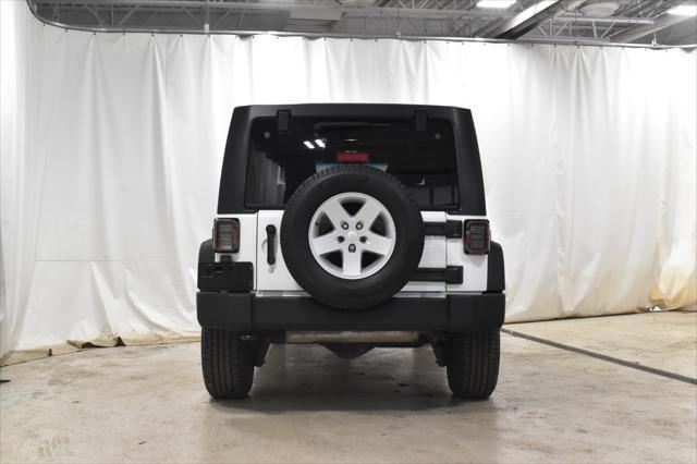 used 2014 Jeep Wrangler Unlimited car, priced at $14,502