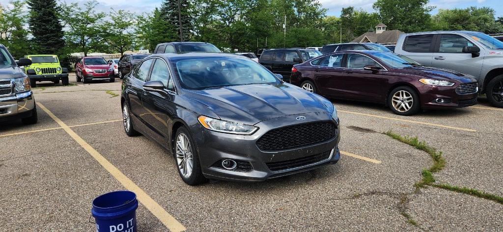 used 2015 Ford Fusion car, priced at $8,490