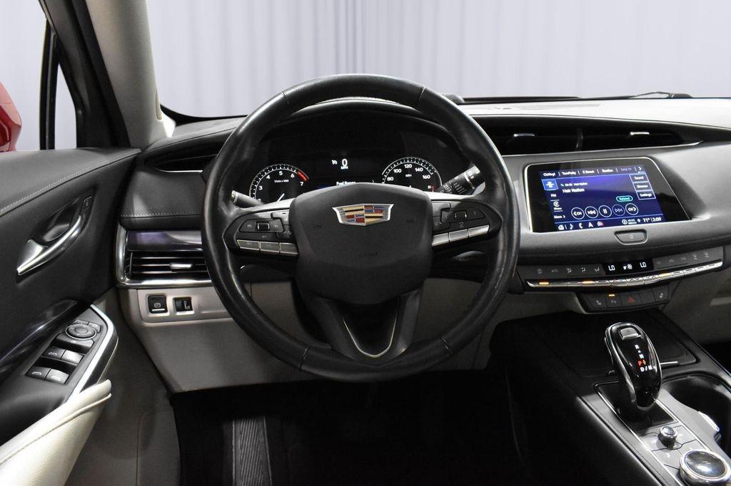 used 2023 Cadillac XT4 car, priced at $28,160