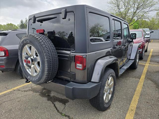 used 2018 Jeep Wrangler JK Unlimited car, priced at $23,405
