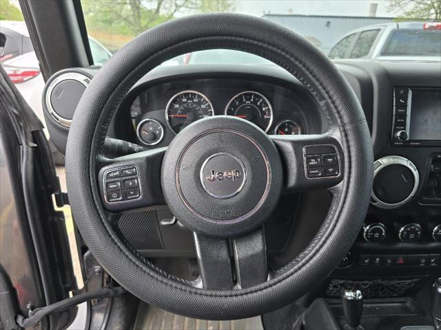 used 2018 Jeep Wrangler JK Unlimited car, priced at $23,405