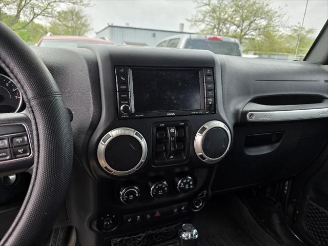 used 2018 Jeep Wrangler JK Unlimited car, priced at $23,405