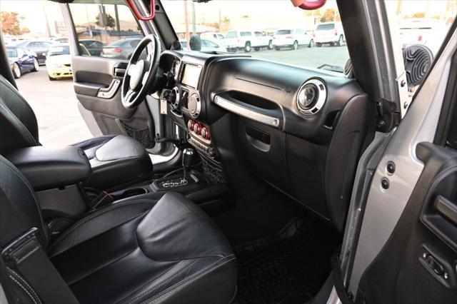 used 2014 Jeep Wrangler Unlimited car, priced at $22,850