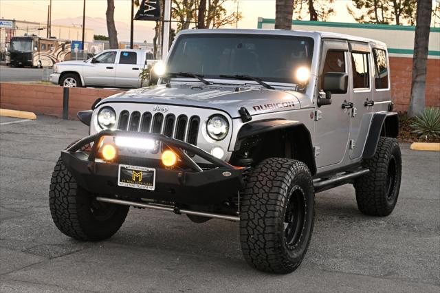 used 2014 Jeep Wrangler Unlimited car, priced at $22,850