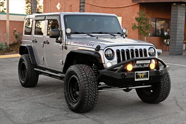 used 2014 Jeep Wrangler Unlimited car, priced at $22,850