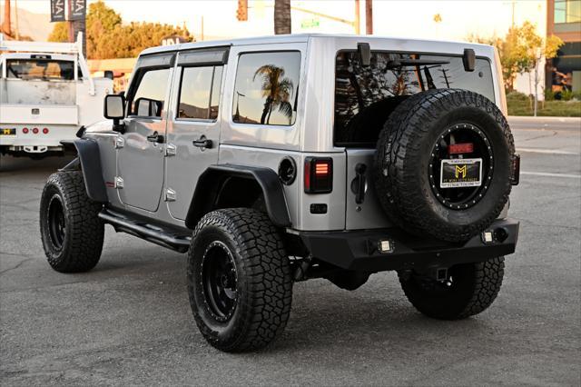 used 2014 Jeep Wrangler Unlimited car, priced at $22,850