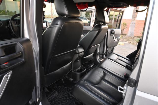 used 2014 Jeep Wrangler Unlimited car, priced at $22,850