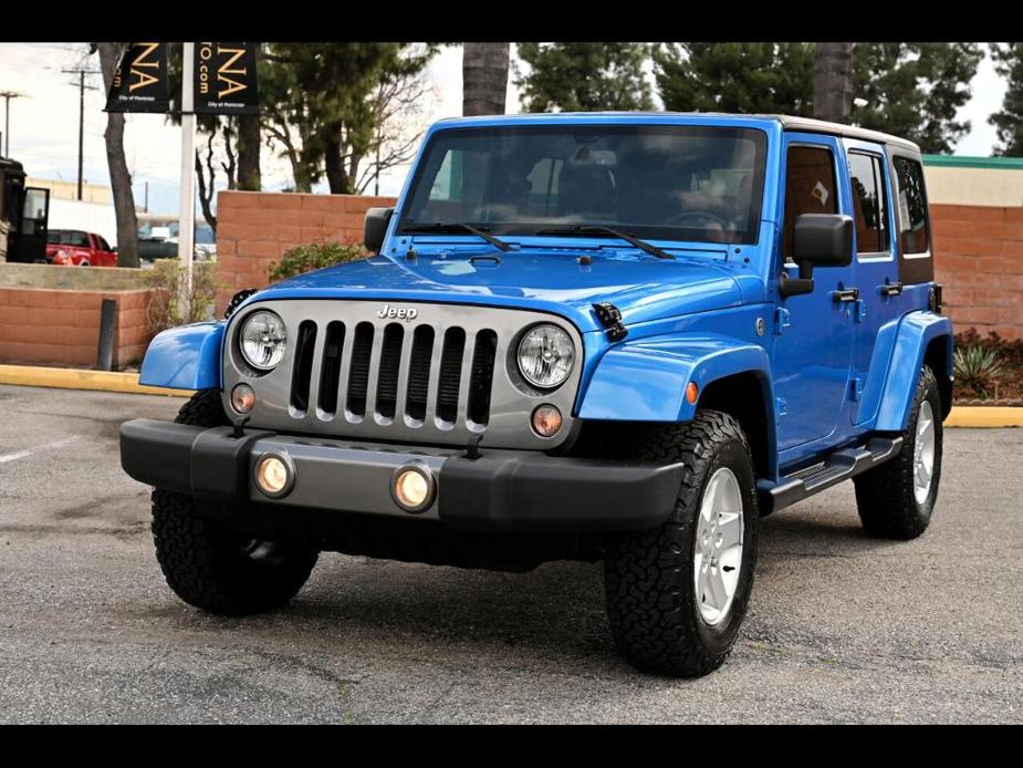 used 2014 Jeep Wrangler Unlimited car, priced at $20,996