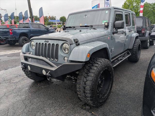 used 2014 Jeep Wrangler Unlimited car, priced at $21,750