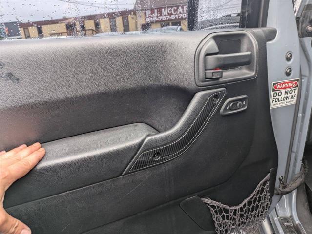 used 2014 Jeep Wrangler Unlimited car, priced at $21,750