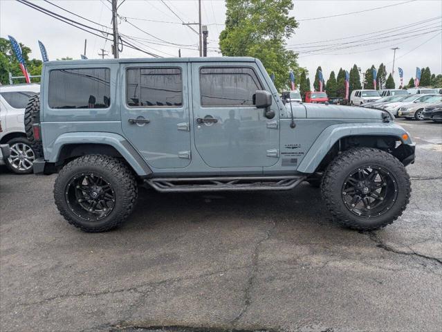 used 2014 Jeep Wrangler Unlimited car, priced at $21,750