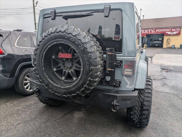 used 2014 Jeep Wrangler Unlimited car, priced at $21,750
