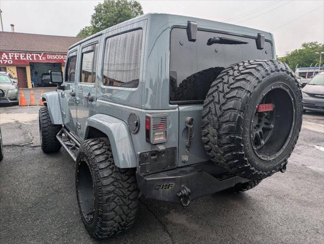 used 2014 Jeep Wrangler Unlimited car, priced at $21,750