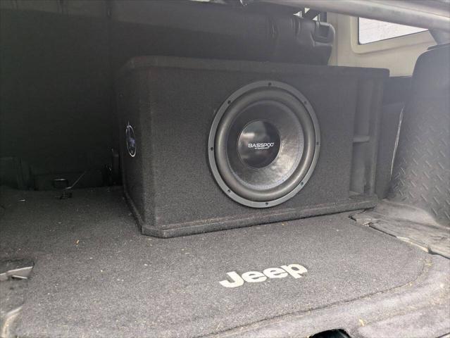 used 2014 Jeep Wrangler Unlimited car, priced at $21,750