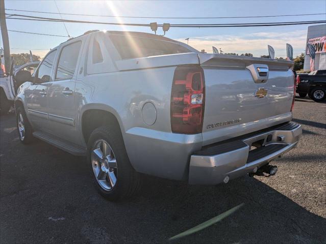 used 2013 Chevrolet Avalanche car, priced at $14,250