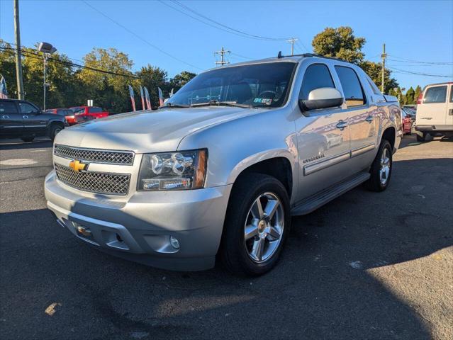 used 2013 Chevrolet Avalanche car, priced at $14,950