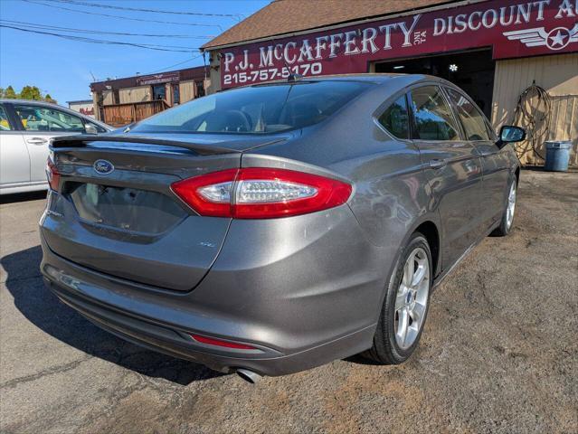 used 2014 Ford Fusion car, priced at $12,250
