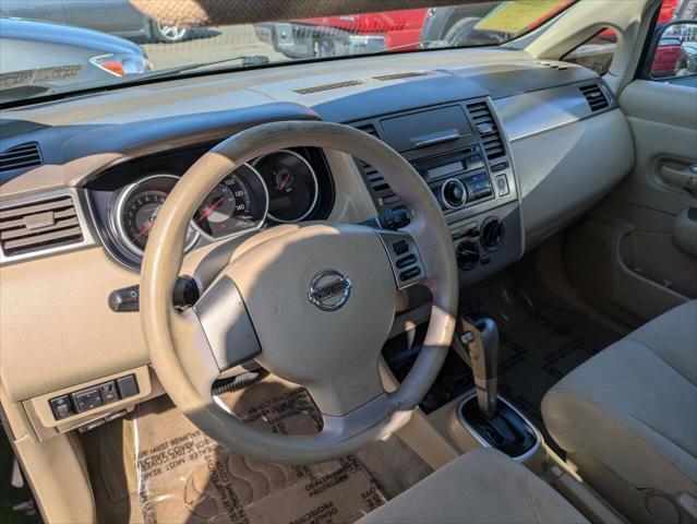 used 2009 Nissan Versa car, priced at $6,950