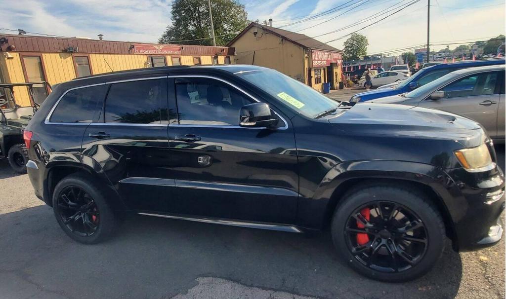 used 2013 Jeep Grand Cherokee car, priced at $18,988