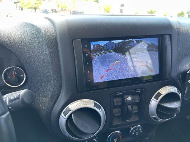 used 2016 Jeep Wrangler Unlimited car, priced at $22,695