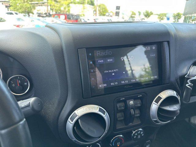 used 2016 Jeep Wrangler Unlimited car, priced at $22,695