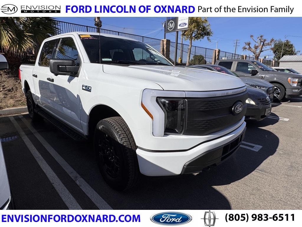 used 2025 Ford F-150 Lightning car, priced at $49,991
