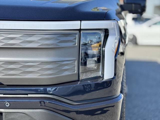 used 2023 Ford F-150 Lightning car, priced at $56,991