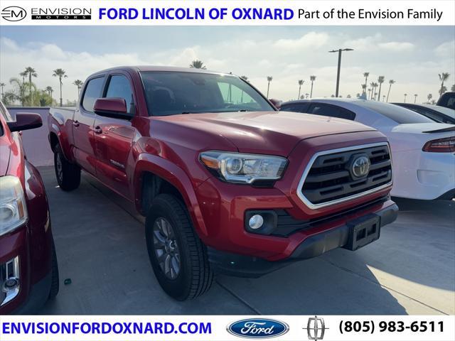 used 2018 Toyota Tacoma car, priced at $27,991