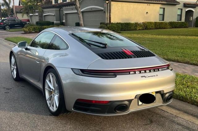 used 2024 Porsche 911 car, priced at $184,900