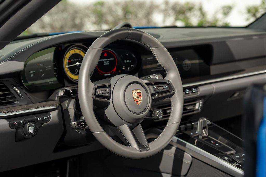 used 2023 Porsche 911 car, priced at $284,900