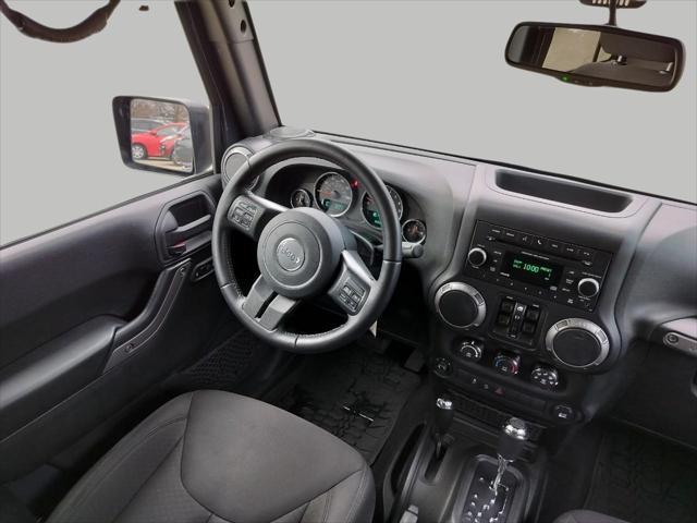 used 2017 Jeep Wrangler Unlimited car, priced at $21,924