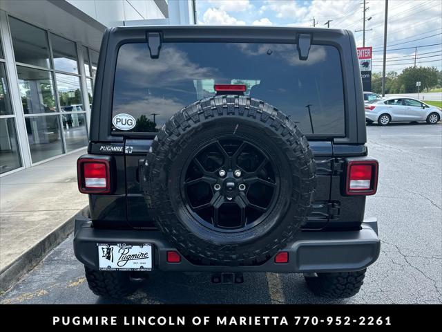 used 2024 Jeep Wrangler car, priced at $44,895