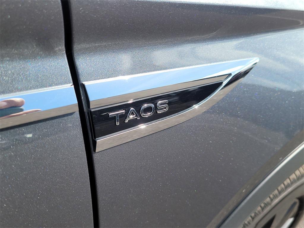 used 2023 Volkswagen Taos car, priced at $19,295