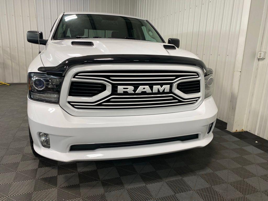 used 2018 Ram 1500 car, priced at $27,168