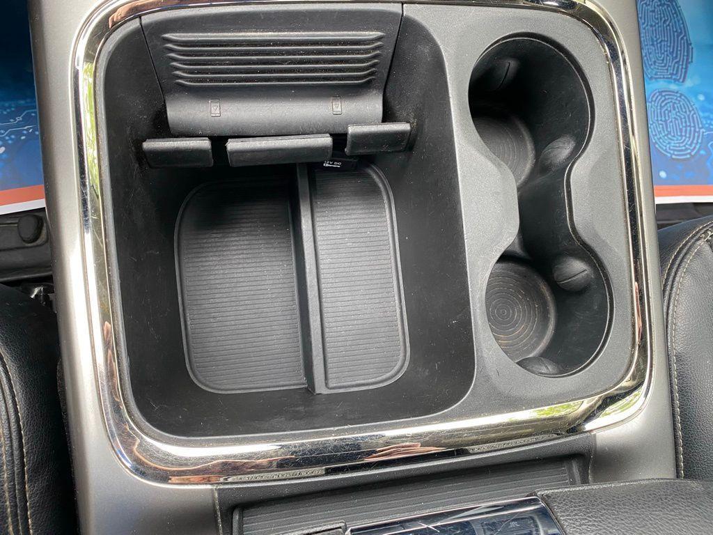 used 2018 Ram 1500 car, priced at $27,168