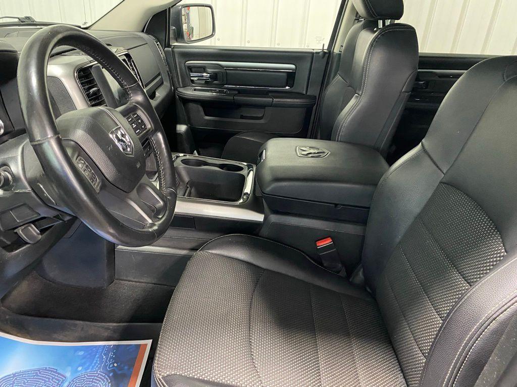 used 2018 Ram 1500 car, priced at $27,168