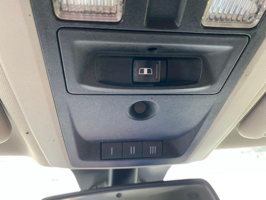 used 2018 Ram 1500 car, priced at $27,168