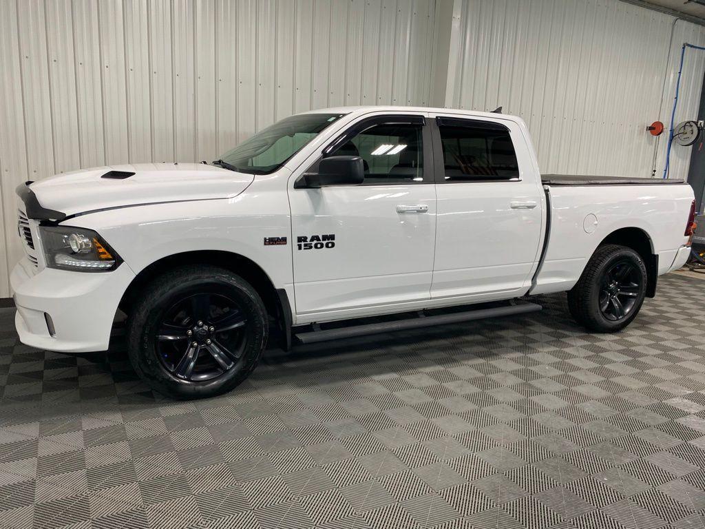 used 2018 Ram 1500 car, priced at $27,168