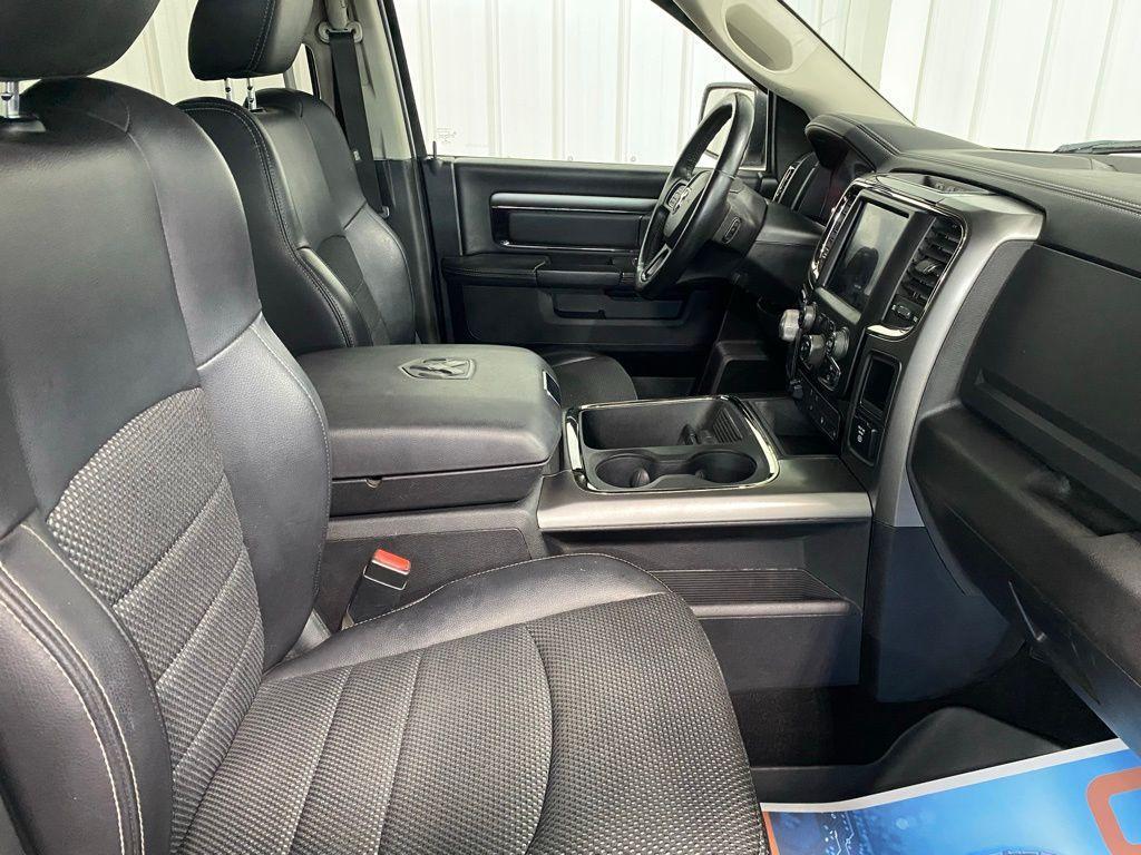 used 2018 Ram 1500 car, priced at $27,168