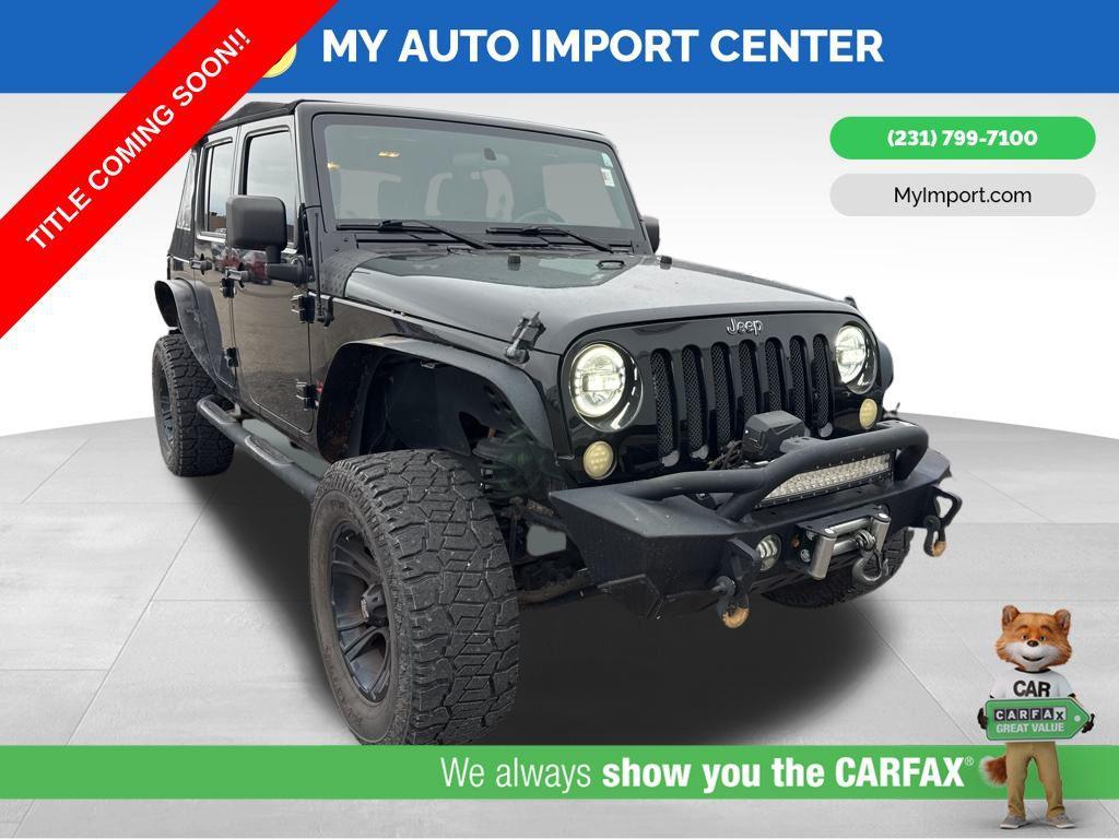used 2010 Jeep Wrangler Unlimited car, priced at $11,685