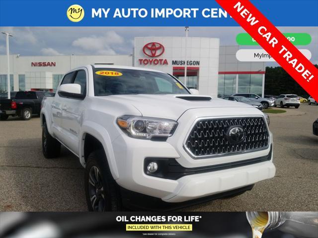 used 2018 Toyota Tacoma car, priced at $26,995